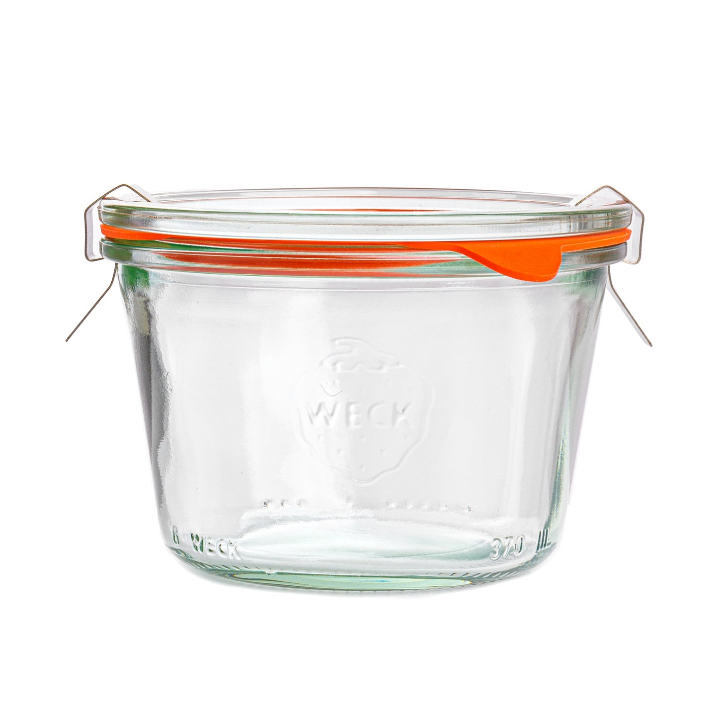 Круглая стеклянная банка Weck с плотными стенками, прозрачной крышкой с гравировкой логотипа Weck, оранжевым силиконовым уплотнителем и металлическими зажимами на белом фоне.
